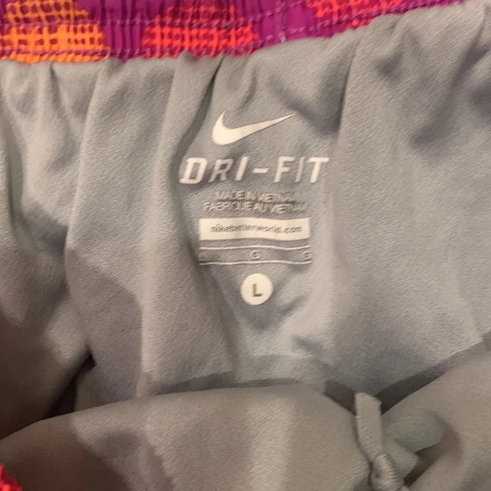 Nike DRI-FIT orange and purple athletic shirt with built in brief size L